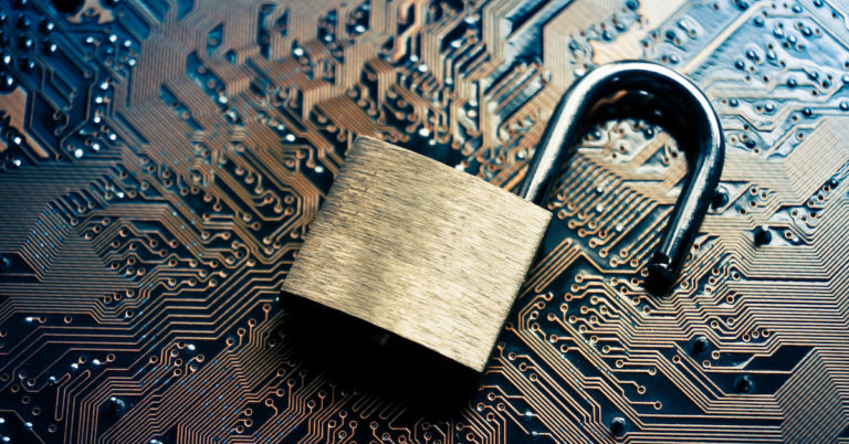 image of open padlock on motherboard symbolizes a data breach | Kendall PC